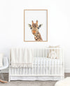 colour pencil drawing of a giraffe on a white background in a teak frame hanging above a cot in a nursery