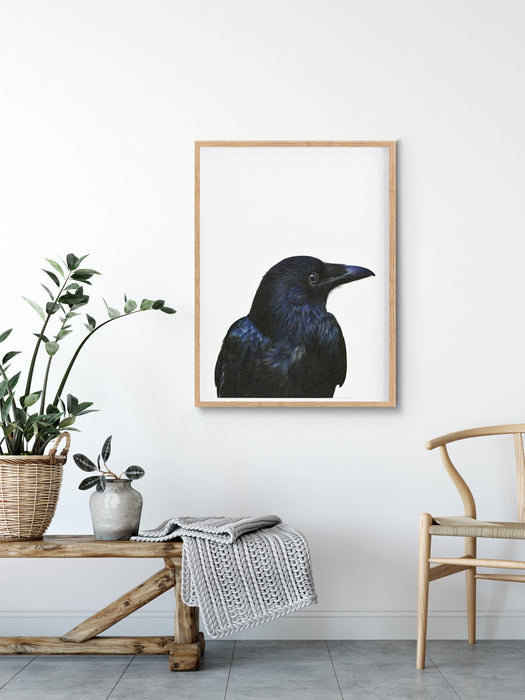 Black Bird Art Print hanging above a timber bench - the wild woods