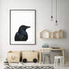 Black Bird Art Print in a black frame hanging in a children's playroom- the wild woods