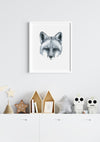black and white art print of a fox in a white frame hanging in a boys room 