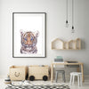 colour pencil drawing of a tiger on a white background in a black frame hanging in a childrens play room