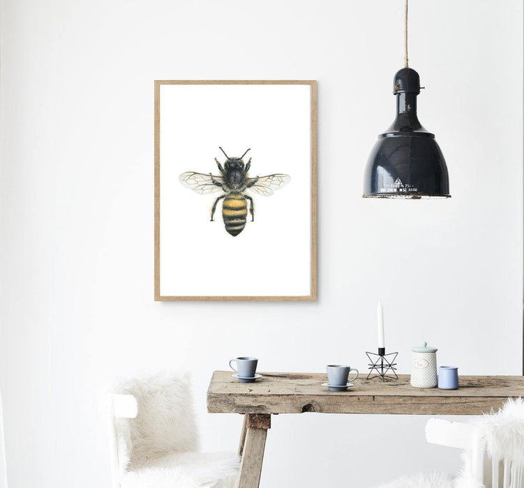 Bee Art Print in a timber frame hanging in a kitchen - the wild woods