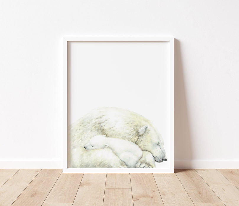 art print of a mother polar bear and a baby in a white frame sitting on a floor